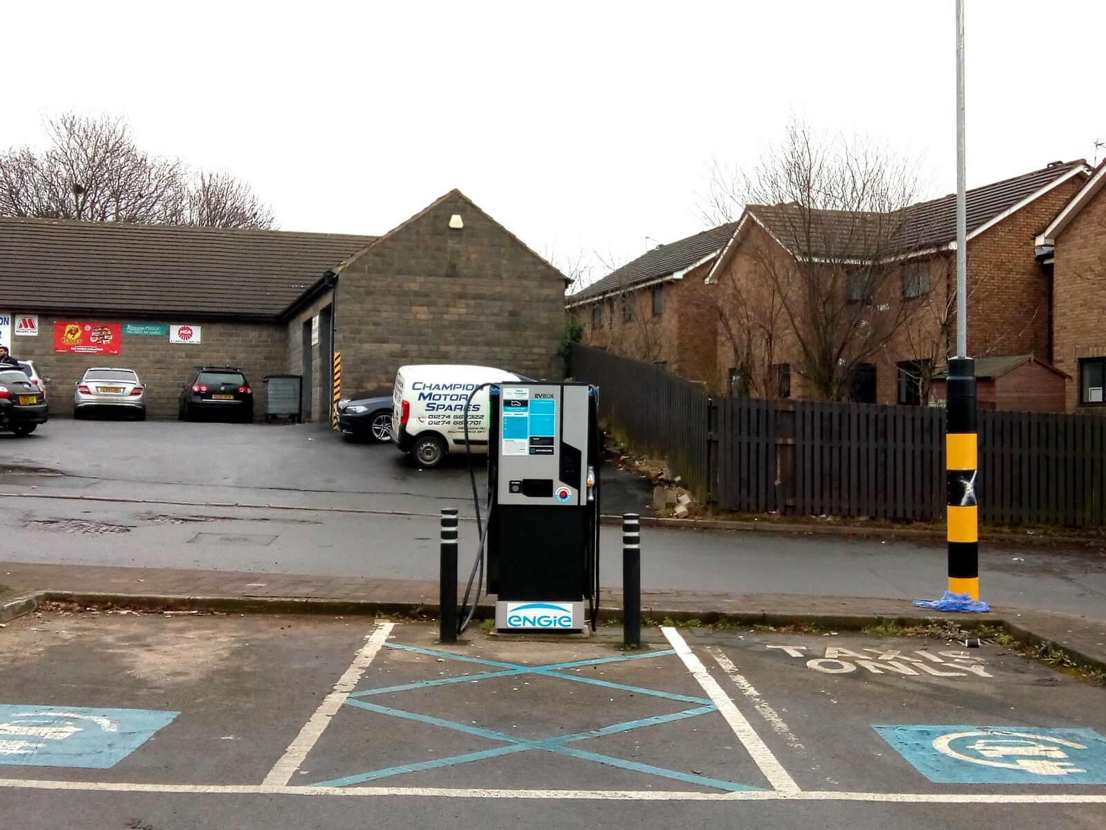 Electric vehicle charging point in a roadside bay in Bradford