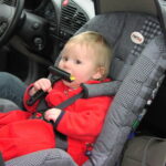 Can a child sit in the front seat of a car in the UK? The rules on airbags, child seats and the exceptions parents should know