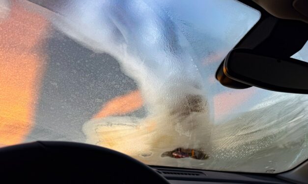 A frost peephole is not enough: clear your windscreen properly before you drive