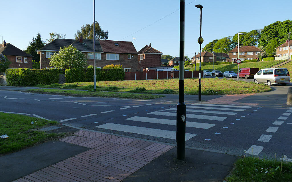 Those zig-zag lines by a crossing are not a quick parking space