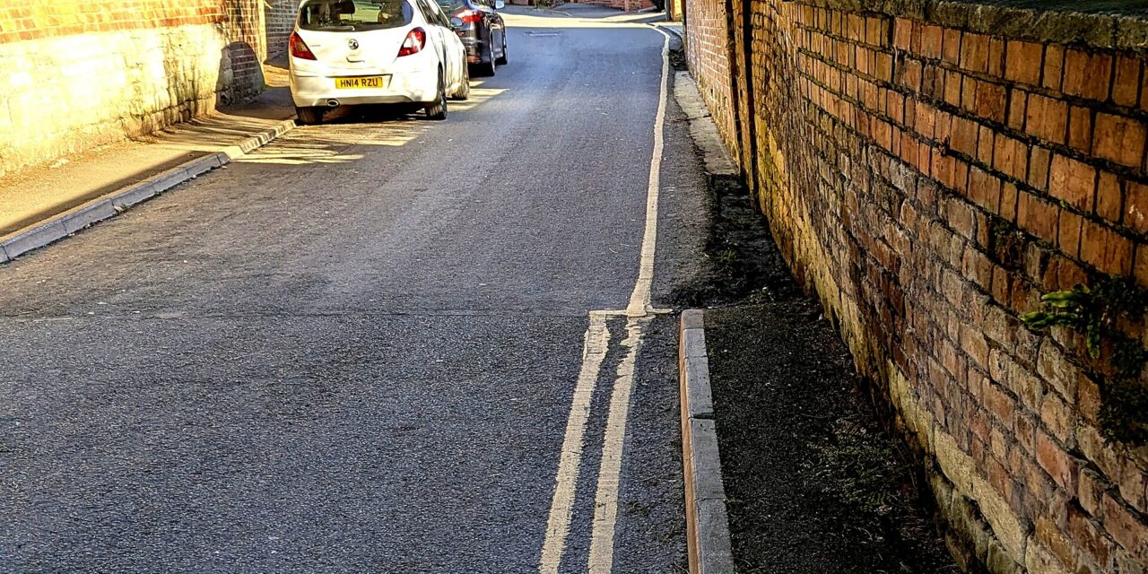 Can you park on a single yellow line? Read the sign, not the paint