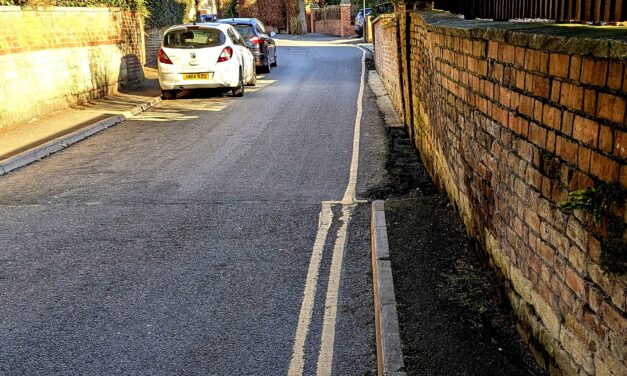 Can you park on a single yellow line? Read the sign, not the paint